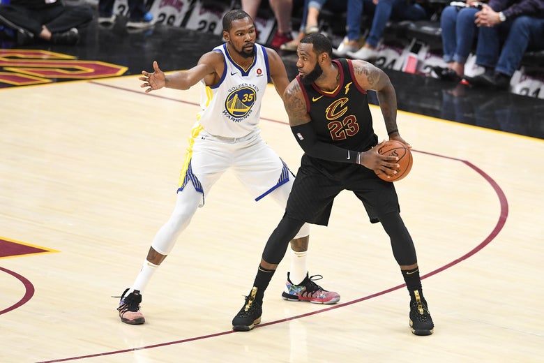 CLEVELAND, OH - JUNE 08: LeBron James #23 of the Cleveland Cavaliers defended by Kevin Durant #35 of the Golden State Warriors during Game Four of the 2018 NBA Finals at Quicken Loans Arena on June 8, 2018 in Cleveland, Ohio. NOTE TO USER: User expressly acknowledges and agrees that, by downloading and or using this photograph, User is consenting to the terms and conditions of the Getty Images License Agreement. (Photo by Jason Miller/Getty Images)